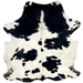 White and Black Speckled Colombian Cowhide: white with large and small, black spots, and faint, black speckles, and a few brown spots on the hind shanks - 6'9" x 5'7" (COSP3187)