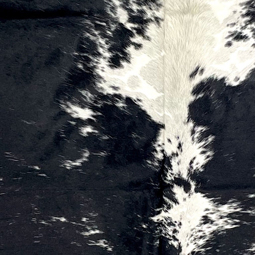 Closeup of this XL Speckled Colombian Cowhide, showing black with white speckles and spots (COSP3350)