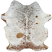 Brown and Off-White Speckled Brazilian Cowhide: off-white with brown speckles and spots, two brand marks on the right side of the back, one on the right side of the butt, and a cluster of brand marks on the left side of the butt - 6'7" x 4'11" (COSP3564)