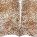 closeup of this Brown and White Speckled Colombian Cowhide, showing one brand mark on each side of the butt   (COSP3575)