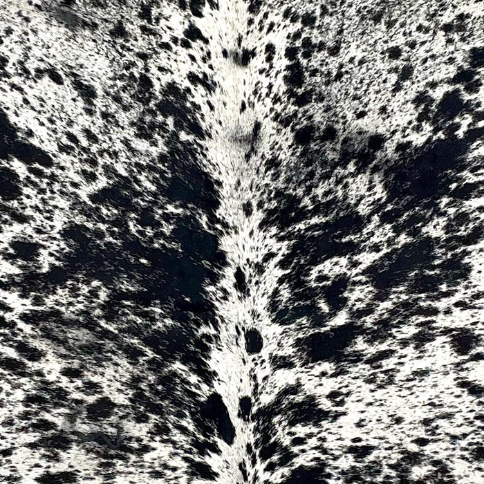closeup of this Speckled Brazilian Cowhide, showing white with black spots and speckles  (COSP3581)