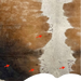 closeup of this Tricolor Speckled Colombian Cowhide, showing one brand mark on the right side of the butt, one on the left side of the back, and two on the left side of the butt (COSP3583)
