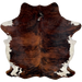 Colombian Tricolor Cowhide:  has a red brown and black, brindle pattern, with white on the belly and part of the shanks - 7'2" x 5'9" (COTR1012)