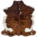 Colombian Dark Tricolor Cowhide, long hair :  has long hair that is a mix of dark brown and black, and it has a few white spots in the middle, and white on the belly  and part of the shanks - 6'4" x 5'2" (COTR1076)