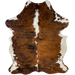 Colombian Tricolor Cowhide:  has a brown and black, brindle pattern, white down most of the spine and part of the shanks, and off-white on the belly - 6'10" x 5'1" (COTR1083)