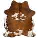 Colombian Tricolor Cowhide:  brown, with faint, black, brindle markings, and it has some white spots with brown and black speckles - 6'6" x 5'1" (COTR1095)