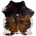 Colombian Tricolor Cowhide:  has a brown and black, brindle pattern, with a couple small, white spots and it has white on the belly and part of the shanks - 7'2" x 5'9" (COTR1130)