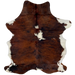 Colombian Tricolor Cowhide:  has a mix of red brown and black, with a couple of white spots down the middle, and white on the belly and part of the shanks - 6'9" x 4'11" (COTR1151)