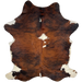 Colombian Tricolor Cowhide: has a red brown and black, brindle pattern, with a few white spots down the middle, and white and off-white on part of the belly and shanks - 7'1" x 5' (COTR1196)