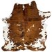 Colombian Tricolor Cowhide: brown with black, brindle markings, and small white spots on the back, and white, with brown spots, on part of the belly, butt, and shanks - 6'7" x 5'5" (COTR1210)