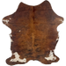 Colombian Tricolor Cowhide: has a mix of reddish brown and black, and off-white spots, with reddish brown speckles, on the shanks, butt, and belly - 6'9" x 4'9" (COTR1213)