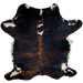 Colombian Dark Tricolor Cowhide: has a black and reddish brown, brindle pattern, with four white spots down the middle of the shoulder, and white spots on the belly and shanks - 7' x 4'11" (COTR1228)