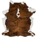 Colombian Tricolor Cowhide: has a reddish brown and black, brindle pattern, with white down the middle of the shoulder, and on the belly and part of the shanks - 7' x 5'3" (COTR1247)