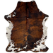 Colombian Tricolor Cowhide: has a mix of reddish brown and black down the middle, and white, with brown and black speckles and spots, on the belly, butt, and shanks, and it has longer hair on the belly - 6'5" x 4'9" (COTR1263)