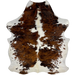 Colombian Tricolor Cowhide: white with large and small spots that have a mix of brown and black down both sides, and it has off-white down pat of the spine - 7' x 5'3" (COTR1288)