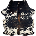 Colombian Tricolor Cowhide: white with small, black spots, and large and small spots that have a mix of black and brown, and it has brown down part of the spine and long hair down the middle of the shoulder - 7'2" x 5'10" (COTR1304)