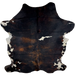 Large Colombian Dark Tricolor Cowhide: has a black and brown, brindle pattern, and a few small, white spots that have black speckles, and it has long hair down the spine, in the middle of the shoulder and on the belly - 7'7" x 5'10"(COTR1320)