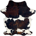 Colombian Tricolor Cowhide: white with faint, black speckles, and large and small spots that have a black and brown, brindle pattern, and it has longer hair, with a curly texture, on the shoulder and belly - 7'2" x 5'2" (COTR1321)