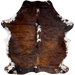 Colombian Tricolor Cowhide: has a brown and black, brindle pattern, with white down part of the spine, and white with black and brown speckles and spots on the belly and shanks - 6'7" x 5'4" (COTR1335)