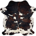 Colombian Tricolor Cowhide: white, with black speckles, and large and small spots that have a mix of black and brown - 7' x 5'10" (COTR1379)