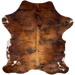 Colombian Tricolor Cowhide: has a reddish brown and black, brindle pattern, and white spots on the belly and shanks - 6'8" x 5'1" (COTR1382)