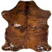 Colombian Tricolor Cowhide: has a reddish brown and black, brindle pattern and a few small, white spots with reddish brown and black speckles - 6'6" x 5'3" (COTR1384)