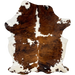 Large Tricolor Colombian Cowhide: has a reddish brown and black, brindle pattern, and large and small, white spots - 7'7" x 5'6" (COTR1392)