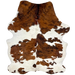 Large Colombian Tricolor Cowhide: white with large and small spots that have a brown and black, brindle pattern, and some faint, black speckles - 7'6" x 5'7" (COTR1438)
