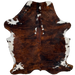 Colombian Tricolor Cowhide: has a red brown and black, brindle pattern, with a few small, white spots down the middle of the shoulder, on the shanks and edge of the neck, and white on the belly - 6'11" x 5'2" (COTR1446)