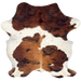 Colombian Tricolor Cowhide: white with large spots that have a red brown and black, brindle pattern, and faint black and reddish brown speckles - 6'2" x 5' (COTR1491)