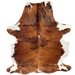 Large Colombian Tricolor Cowhide: has a reddish brown and black, brindle cowhide, with two white spots down the middle, and white on the belly and part of the shanks - 7'7" x 5'3" (COTR1527)