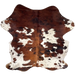 Colombian Tricolor Cowhide: has a mix of reddish brown and black, and white spots that have black and brown speckles and spots - 6'9" x 5'2" (COTR1543)