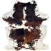Colombian Tricolor Cowhide: has long hair that is white with large and small spots that have a mix of back and reddish brown - 6'10" x 5' (COTR1546)