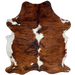 Colombian Tricolor Cowhide: has a red brown and black, brindle pattern, white spots down the middle and on the belly, and long hair down the spine and on the belly - 6'6" x 5' (COTR1608)