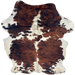 Colombian Tricolor Cowhide: has large and small spots with a reddish brown and black, brindle pattern, white spots with black speckles, and long hair down part of the spine and on the belly - 7'3" x 5'5" (COTR1637)