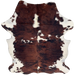 Colombian Tricolor Cowhide: has a mix of red brown and black, white spots on the back, white on the belly and shanks, and long hair down the middle of the shoulder - 7'2" x 5'3" (COTR1640)