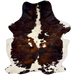 Large Colombian Tricolor Cowhide: white with large and small spots that have a black and brown, brindle pattern, and longer hair down the spine and on the belly - 7'6" x 5'8" (COTR1667)