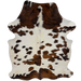 Colombian Tricolor Cowhide: white with spots that are brown and black, and off-white longer hair down the middle of the shoulder - 6'6" x 4'8"(COTR1682)