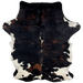 Colombian Dark Tricolor Cowhide:  has a mix of black and reddish brown, with a few white spots down the spine, and white, with a few black speckles, on the belly and shanks - 6'7" x 4'9" (COTR861)