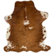 Colombian Tricolor Cowhide:  mostly reddish brown, with a few small, black spots, some small, white spots on the back, and white with brown spots on the belly and shanks - 6'5" x 4'8" (COTR900)