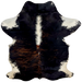 Colombian Dark Tricolor Cowhide:  has a black and red brown, brindle pattern, long white hair down the middle of the shoulder, and white with black spots on the shanks and part of the belly - 6'11" x 4'7" (COTR904)