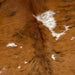 Closeup of this Colombian, Tricolor Cowhide, showing a brown and black, brindle pattern, and spots that are white with brown and black speckles (COTR910)