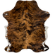 Colombian Tricolor Cowhide:  has a brown and black, brindle pattern covering most of the hide, and white with brown and black spots on the belly and hind shanks, and the fore shanks have small, white spots on them - 6'6" x 5' (COTR985)
