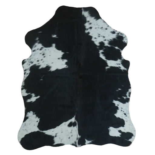 Black and White cowhide rug, 4' x 3', shown on white background (SS-BW-004)