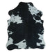 Black and White cowhide rug, 4' x 3', shown on white background (SS-BW-004)