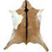 Light Brown and White Goatskin:  light brown, with a white spot on both sides, and black down the spine - 3'2" x 2'6" (GOAT330)