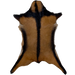 Brown and Black Goatskin:  brown with a black strip across the shoulder and along the edge of the belly, and it has a strip of black, longer hair down the middle - 3'1" x 2'5" (GOAT347)