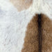 Closeup of this Goatskin, showing white with brown spots and a few brown speckles (GOAT420)