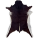 Dark Brown and White Goatskin:  dark brown with a strip of white above the tail and white on the belly - 2'11" x 2'2"  (GOAT451)