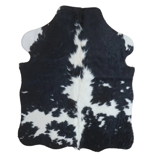 Black and White cowhide rug, 4' x 3', shown on white background (SS-BW-057)